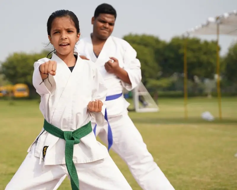 kids practicing martial arts benefits together