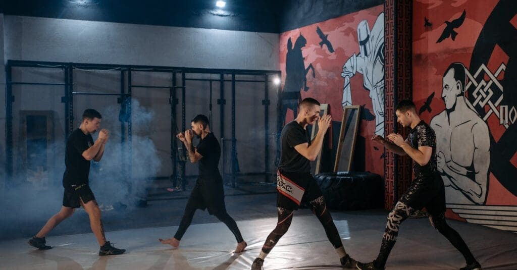 Students practicing controlled sparring during group sessions for martial arts training for beginners